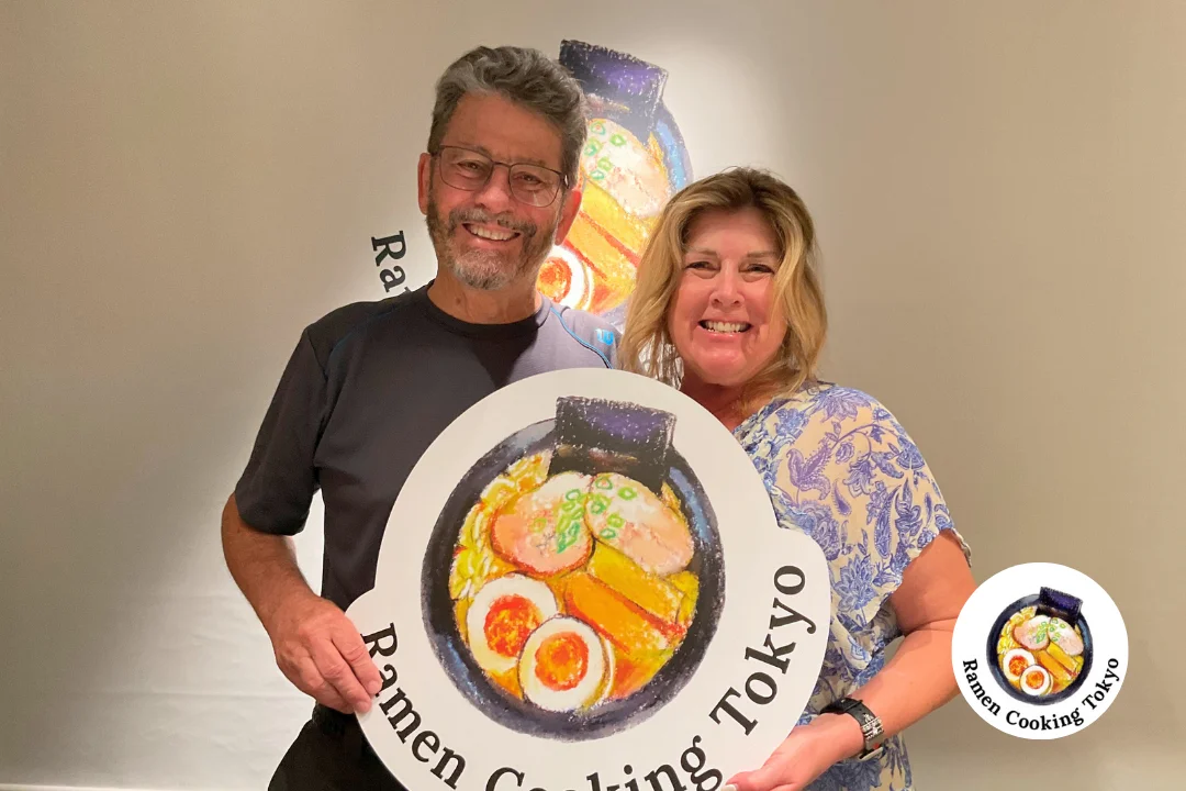 Couple taking a memorable photo with the RCT logo