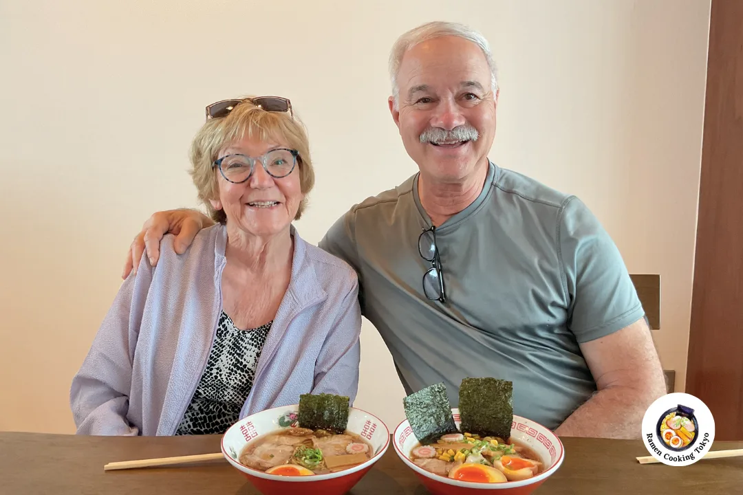 Happy couple enjoying their handmade ramen at Ramen Cooking Tokyo