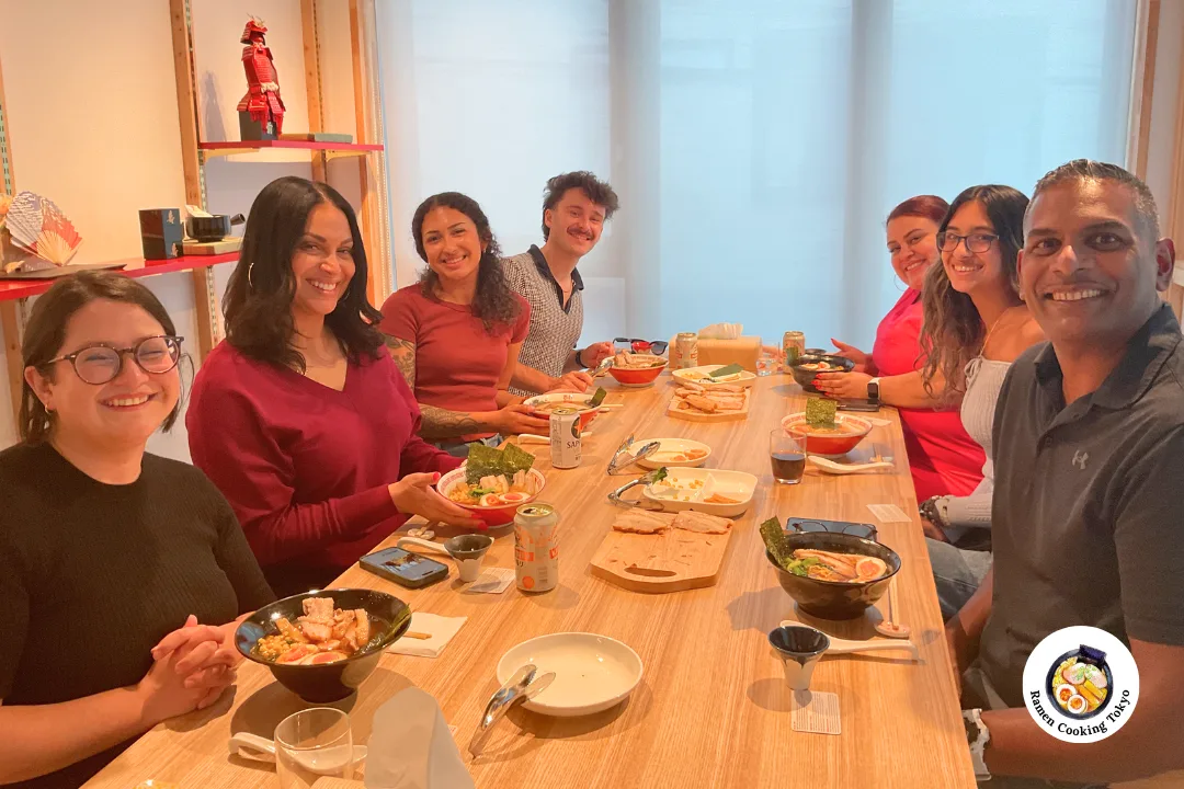 Small group enjoying their cooking class experience at Ramen Cooking Tokyo