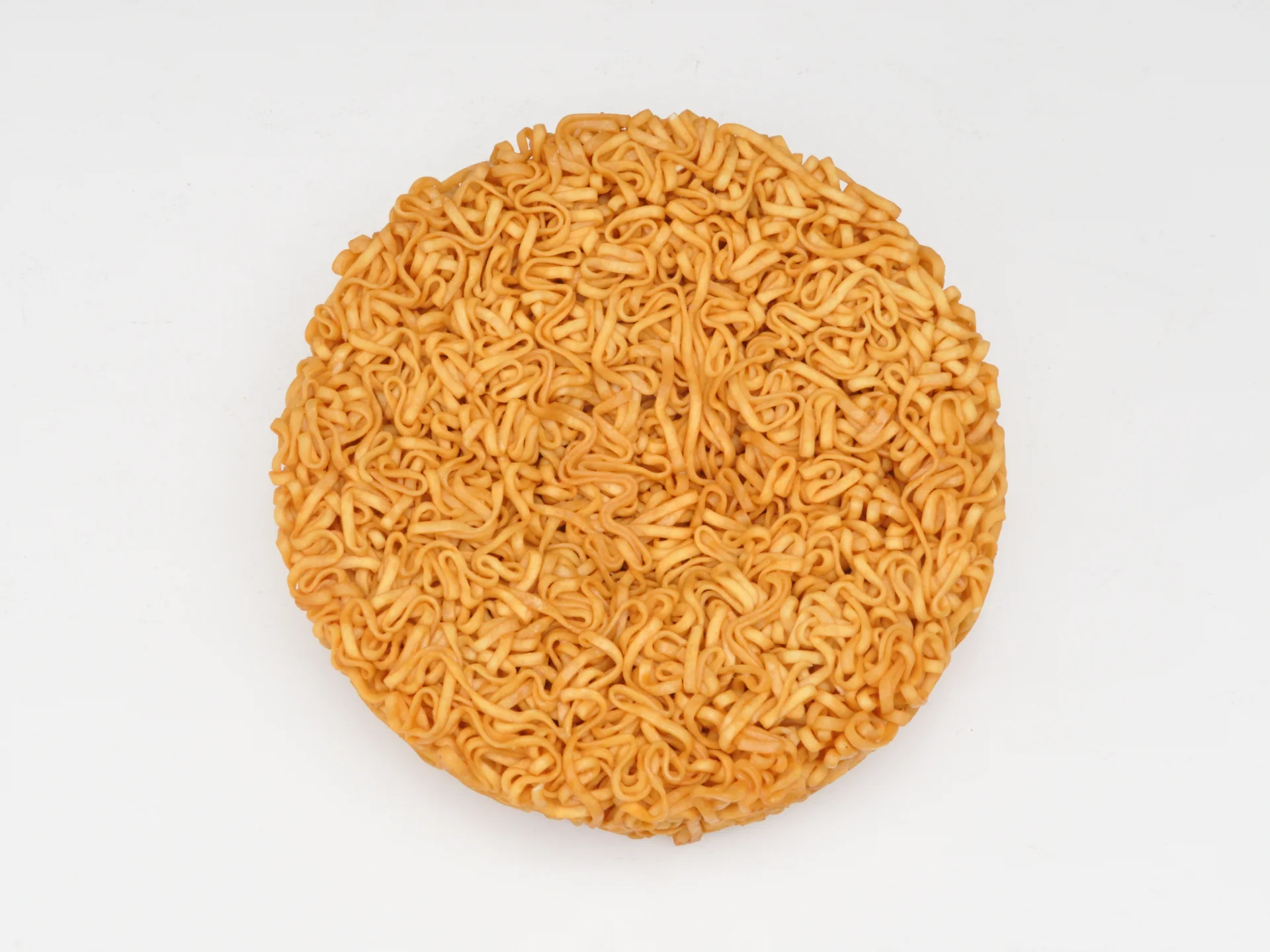 Modern Nissin Chicken Ramen retail package on a plain background