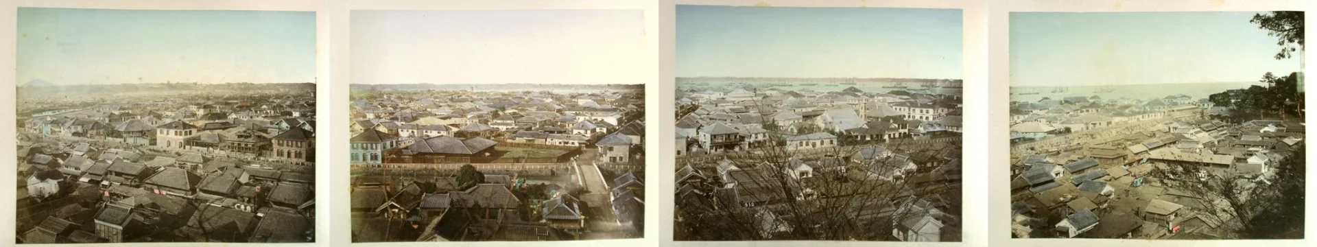 Hand-colored panoramic Meiji photograph of the Yokohama foreign settlement from above