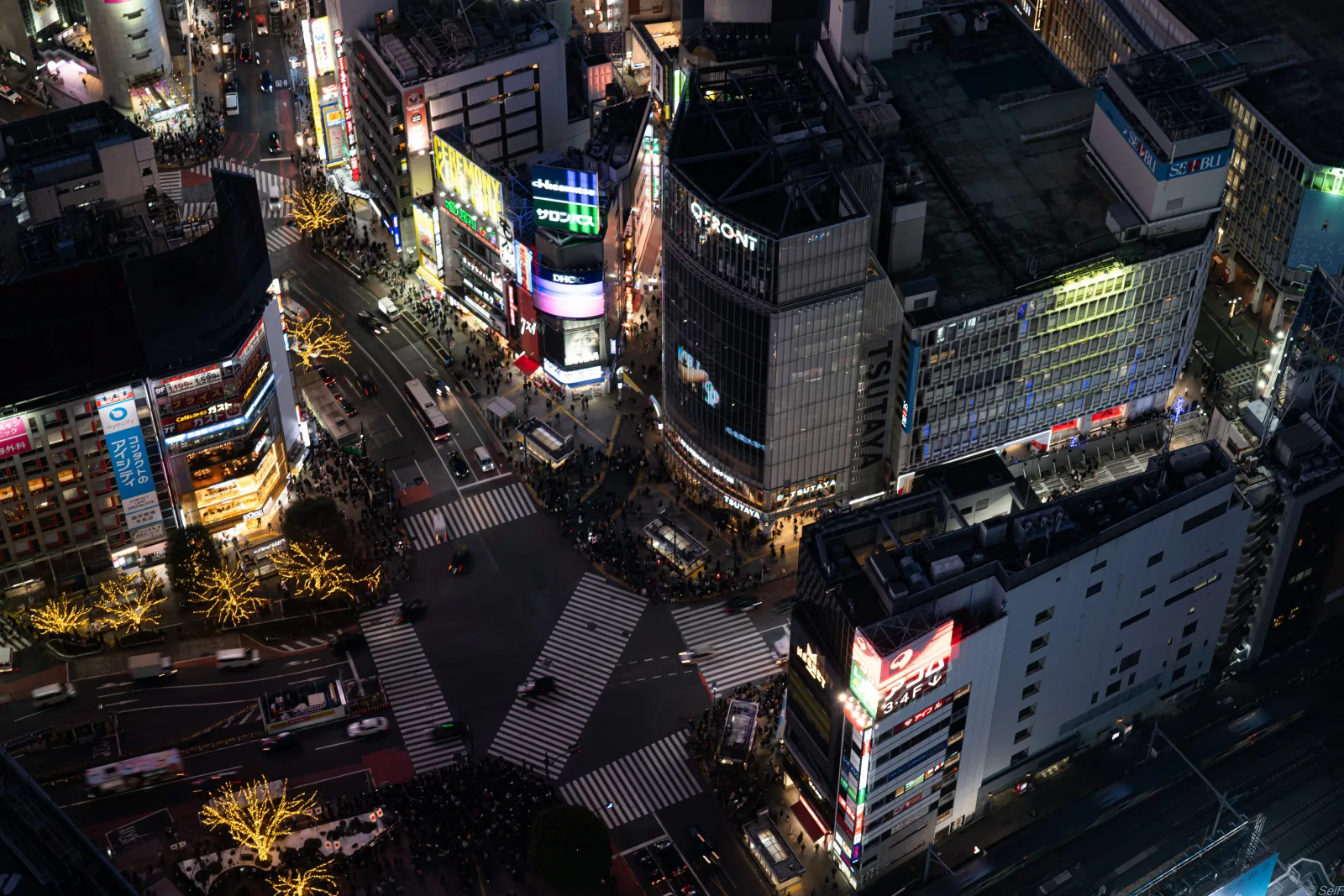 Shibuya Crossing seen from above at night from Shibuya Sky
