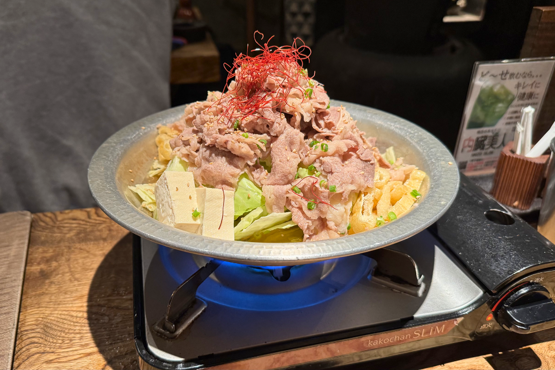 Clear beef soup hot pot with tender sliced beef