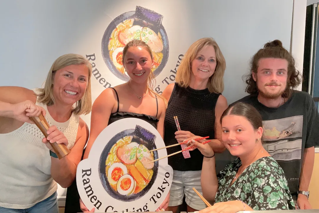 Family enjoying a sushi and ramen cooking class at Ramen Cooking Tokyo