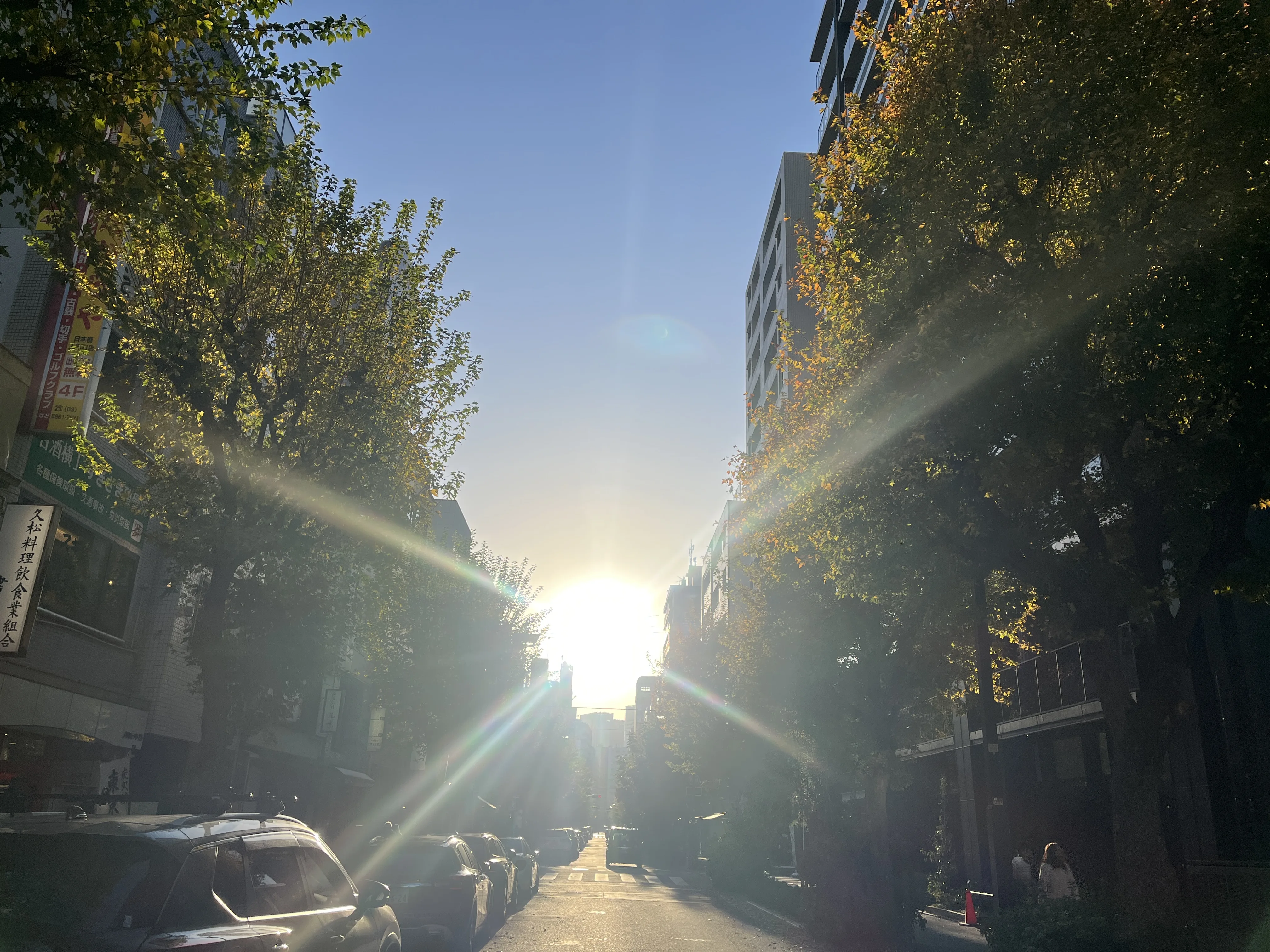 Golden evening sunlight streaming through Amazake Yokocho