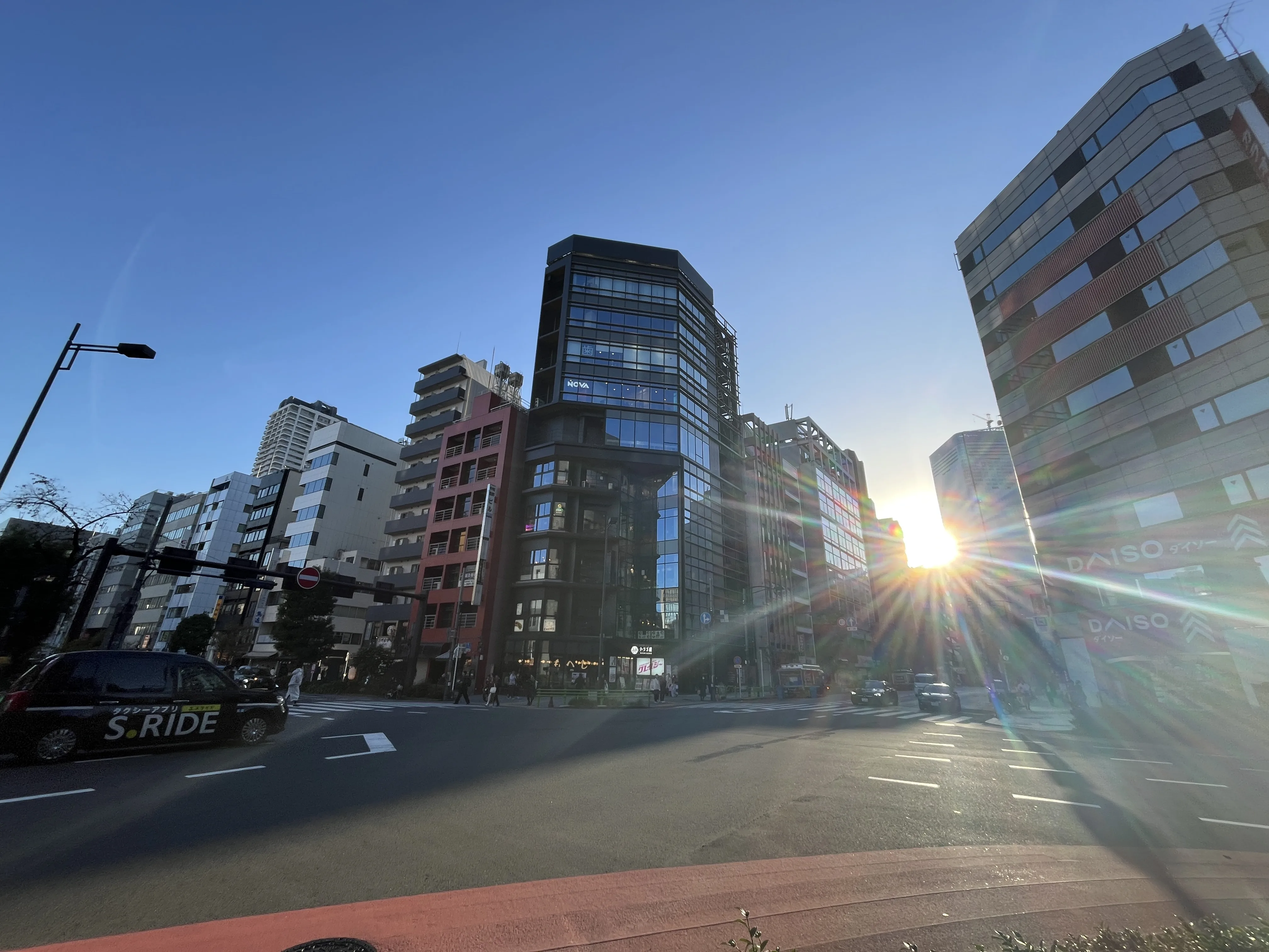 Evening light streaming through the buildings in Ningyocho