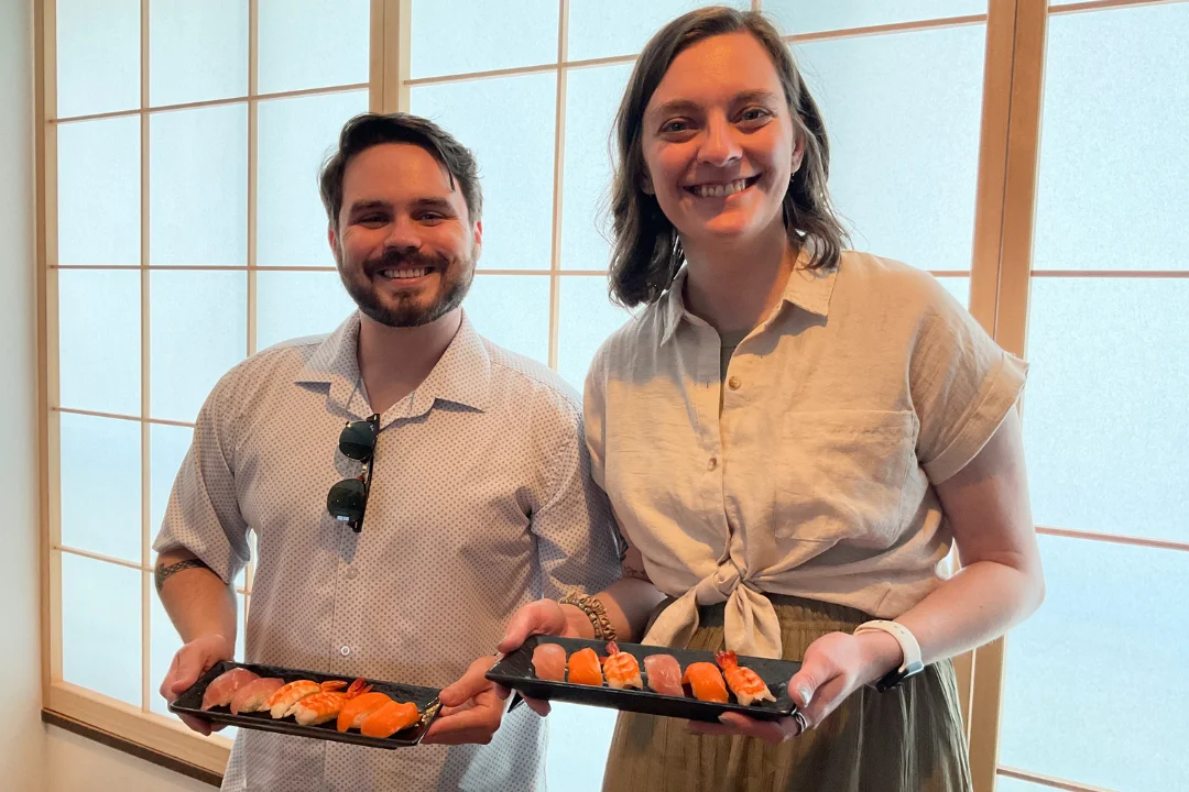 Happy guests after completing their cooking class — smiles that say it all