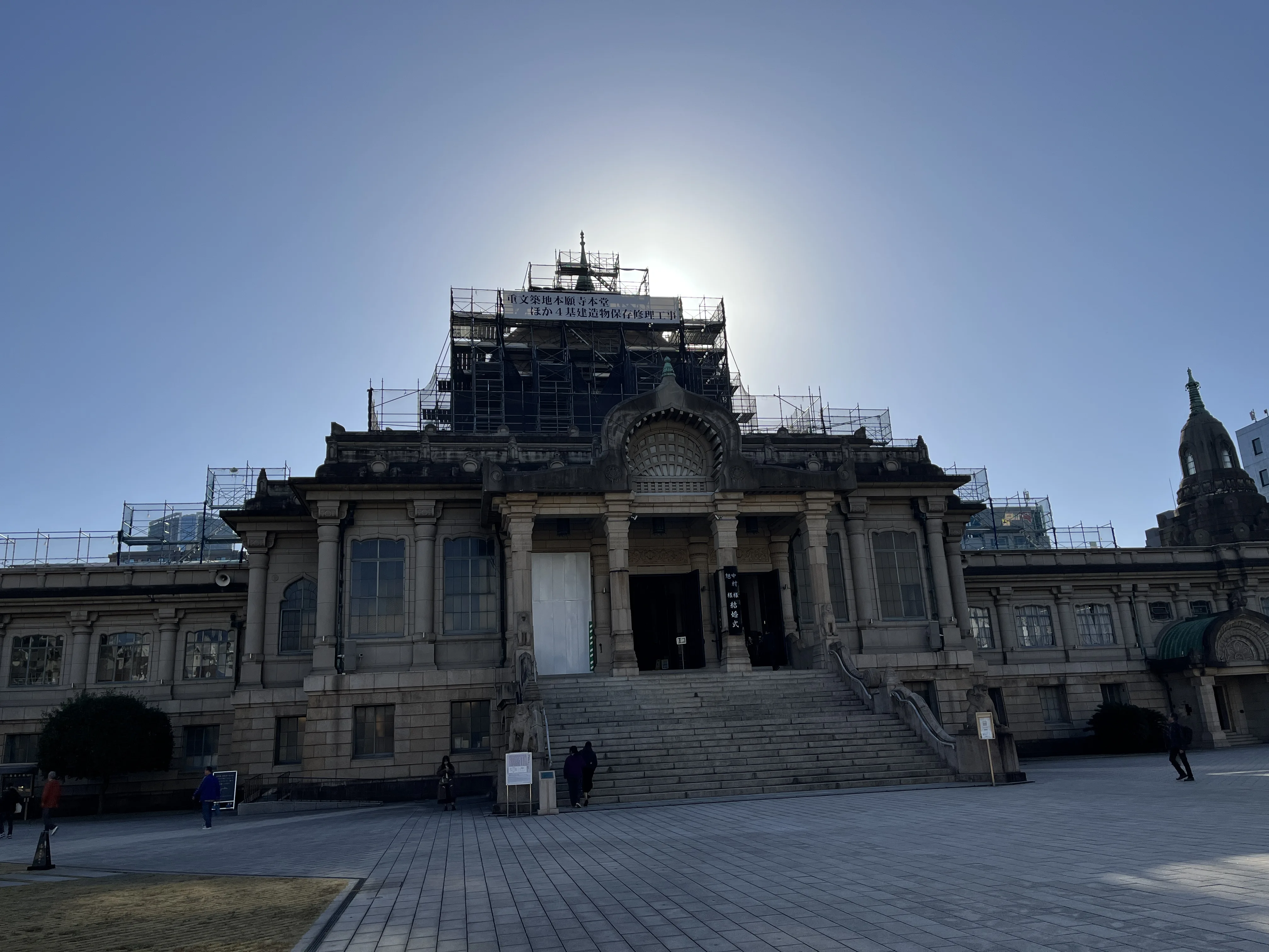Majestic Tsukiji Honganji Temple with the sun behind it