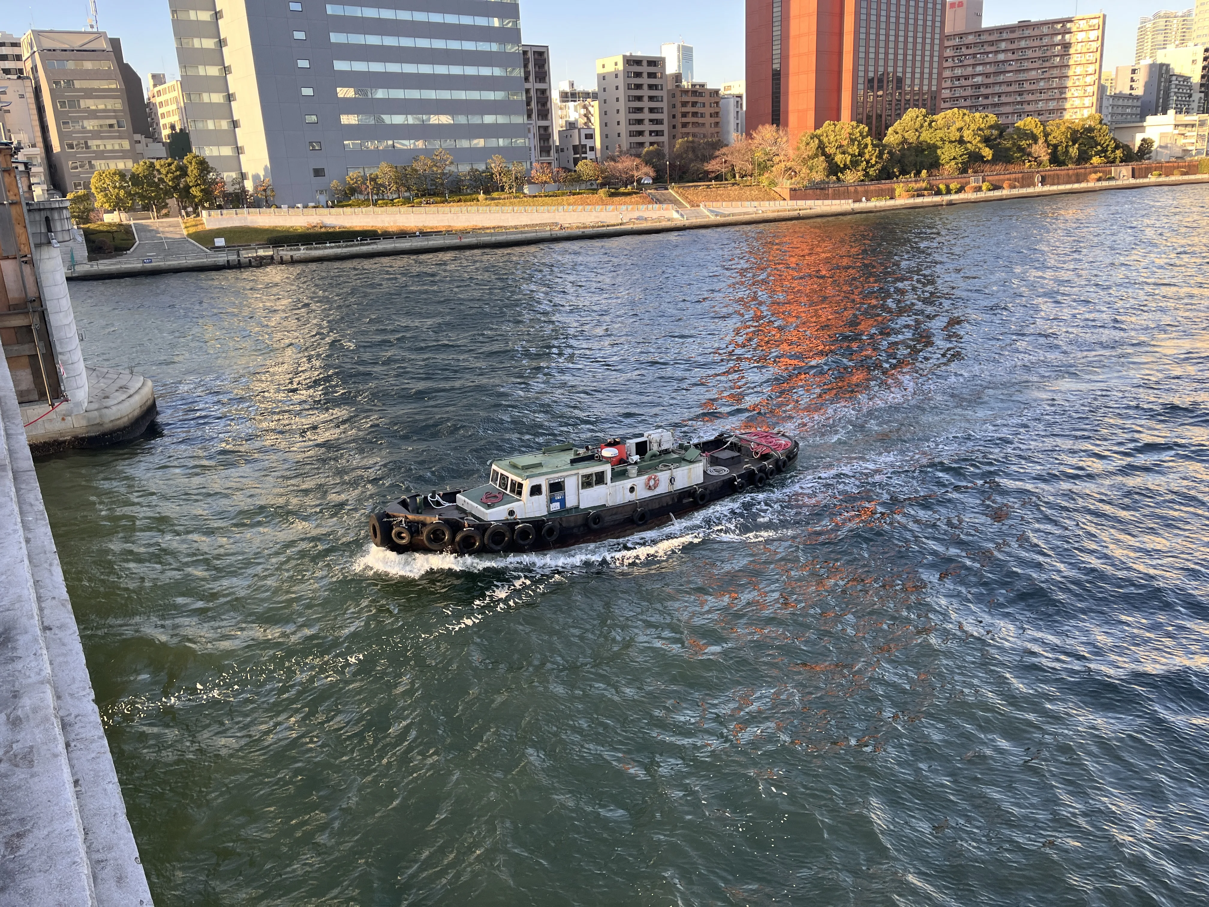 Boat passing under Kachidoki Bridge