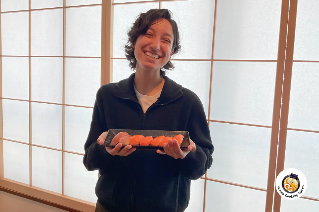 Guest smiling with completed dishes
